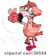 Peaceful Pink Flamingo Smiling And Gesturing The Peace Sign With His Hand