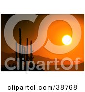 Clipart Illustration Of A Bright Orange Sunset Silhouetting Cactus And Mountains by dero
