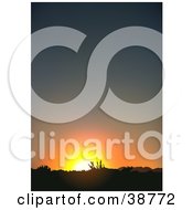 Poster, Art Print Of Orange Sun Setting Behind A Landscape