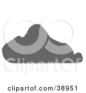 Clipart Illustration Of A Gray Silhouetted Triangular Boulder by Tonis Pan