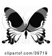 Clipart Illustration Of A Black And White Butterfly With Long Extensions On Its Lower Wings
