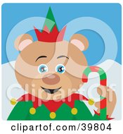 Clipart Illustration Of A Blue Eyed Christmas Elf Teddy Bear Holding A Candy Cane