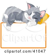 Poster, Art Print Of Adorable Gray Kitten Napping On A Pillow Over A Blank Text Box