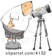 Male Astronomer Looking Through A Telescope