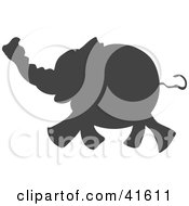 Clipart Illustration Of A Gray Silhouetted Elephant