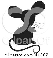 Clipart Illustration Of A Black Silhouetted Mouse