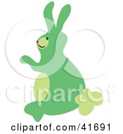 Clipart Illustration Of A Green Hare Sitting Up by Prawny