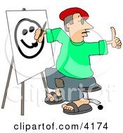 Male Artist Drawing A Smiley Face On Canvas With A Paintbrush