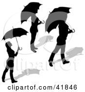 Poster, Art Print Of Three Black Silhouetted Women Standing With Umbrellas