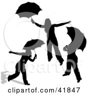Poster, Art Print Of Three Black Silhouetted Women Playing With Umbrellas
