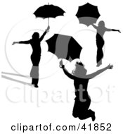 Clipart Illustration Of Three Black Silhouetted Women Presenting With Umbrellas