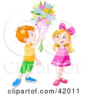 Red Haired Boy Holding A Flower Bouquet Over A Little Girl