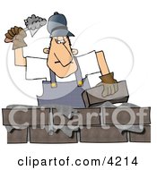Male Builder Cementing A Brick Wall