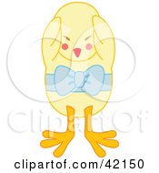Clipart Illustration Of A Shy Yellow Chick Wearing A Blue Bow