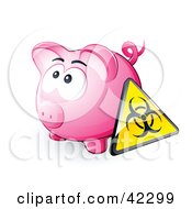 Biohazard Sign Resting Against A Pink Piggy Bank