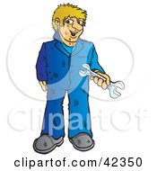 Poster, Art Print Of Dirty Blond Male Mechanic Holding A Wrench