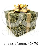 Gold Ribbon And Bow Around A Green Gift