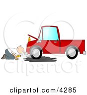 Man Trying To Give A Red Truck An Oil Change Clipart