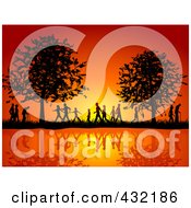 Poster, Art Print Of Silhouetted People Of All Ages Walking On The Waterfront In The Country Side Against An Orange Sunset