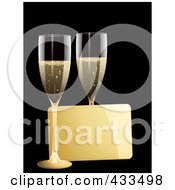 Gold Message Tag Between Two Glasses Of Champagne