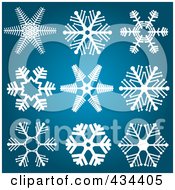 Poster, Art Print Of Digital Collage Of White Snowflake Designs On A Blue Background