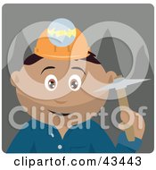 Hispanic Miner Man Wearing A Headlamp And Holding A Pickaxe
