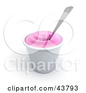 Spoon In A Cup Of Strawberry Frozen Yogurt