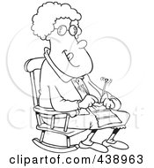 Cartoon Black And White Outline Design Of A Granny Knitting In A Rocking Chair
