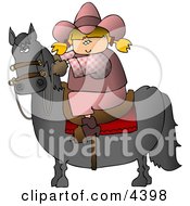 Teenage Cowgirl Riding A Saddled Horse With Reins