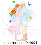 Blond Man Adoring A Red Haired Woman Surrounded By Butterflies
