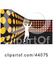 Silhouetted White Man Celebrating By An Orange Dot Wall On Black And White