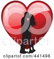 Poster, Art Print Of Silhouetted Couple Kissing Over A Shiny Red Heart