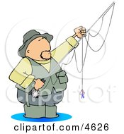 Fly Fisherman Standing In Water With A Baited Hook On A Rod And Reel