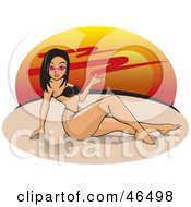 Sexy Hispanic Woman In A Bikini On A Sunset Beach