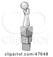 White Design Mascot Man Thinking And Standing On Blocks