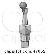 Gray Design Mascot Man Thinking And Standing On Blocks