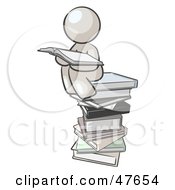Poster, Art Print Of White Design Mascot Man Reading On A Stack Of Books
