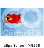 Waving Timor Leste Flag Against A Blue Sky
