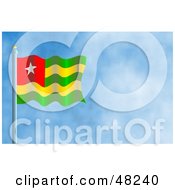 Waving Togo Flag Against A Blue Sky