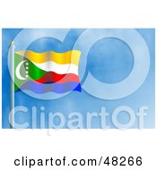 Poster, Art Print Of Waving Comoros Flag Against A Blue Sky