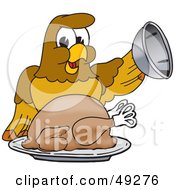Hawk Mascot Character Serving A Turkey