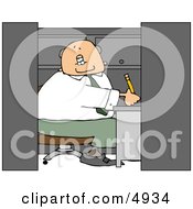 Elderly Businessman Working In A Small Office Cubicle