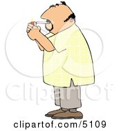 Man Lighting A Cigarette With A Lighter