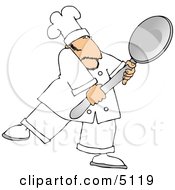 Caucasian Male Chef Carrying A Big Spoon