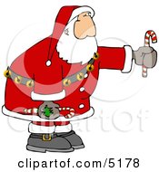 Santa Holding Candy Canes Clipart