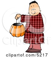 Boy Wearing Halloween Pajamas Costume While Trick-Or-Treating