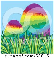 Royalty Free RF Clipart Illustration Of Two Rainbow Easter Eggs Nestled In Grass