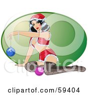 Poster, Art Print Of Sexy Christmas Pinup Woman In A Santa Suit And Stockings Holding Up An Ornament