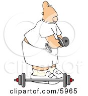 Bald Man Lifting Weights At A Gym