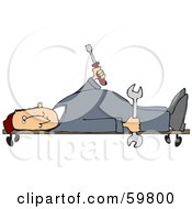 Royalty Free RF Clipart Illustration Of A Male Mechanic Laying On A Creeper And Holding Tools by djart